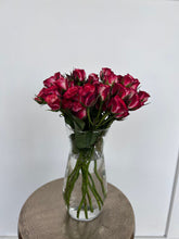 Paragon clear glass vase with red spray roses — Flowers Station Winnipeg
