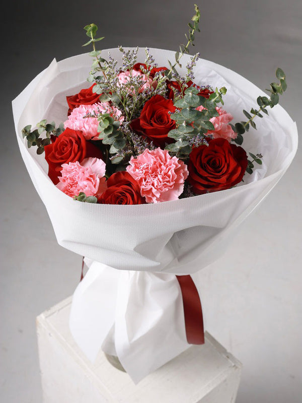 Delicate Obsession bouquet red roses pink carnations and eucalyptus - Flowers Station Winnipeg