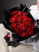 From a Gentleman bouquet with 25 red white and pink roses hand-tied - Flowers Station Winnipeg