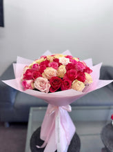 Petal Kiss bouquet 50 pink roses top view - Flowers Station Winnipeg
