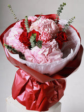 Power of Love bouquet wrapped presentation with roses and hydrangeas