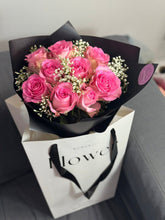 Midnight Elegance bouquet red roses with babys breath wrapped in black paper - Flowers Station Winnipeg